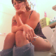 A girl smokes a cigarette to loosen her bowels. A couple of small plop sounds are heard. After much straining, she seems satisfied and then wipes her ass. No poop is actually seen. Presented in 720P HD video. About 6 minutes.